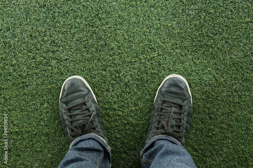 Canvas sneakers on grass © foto76