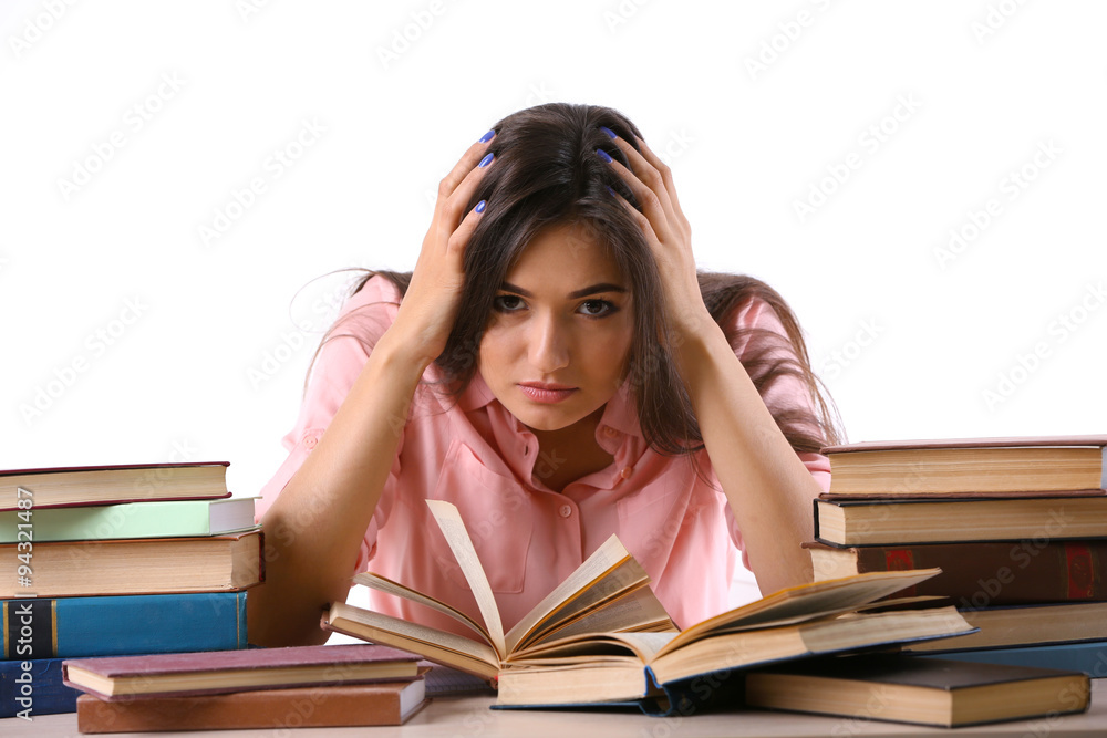 Young girl with books isolated on white Young girl with books isolated on white