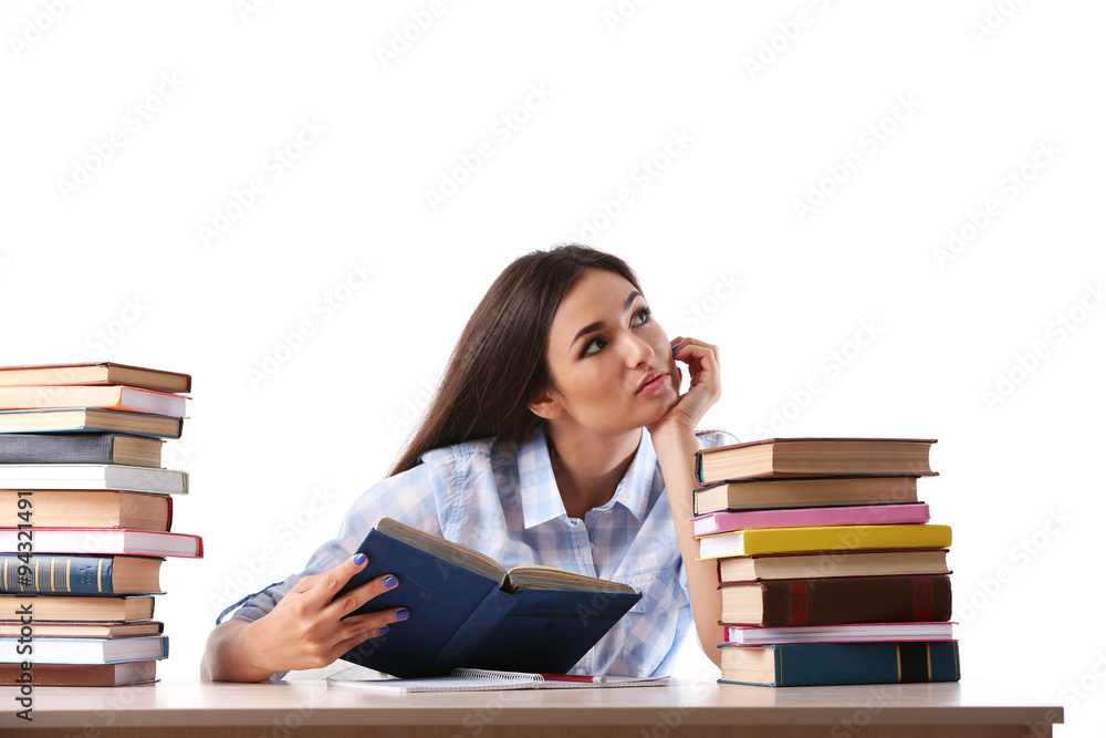 Young girl with books isolated on white Young girl with books isolated on white