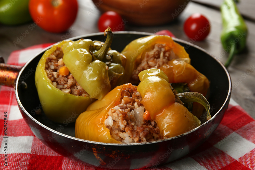 Stuffed peppers with vegetables on table close up Stuffed peppers with vegetables on table close up