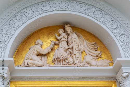 The Sculpture of  in front of The Catholic Church photo