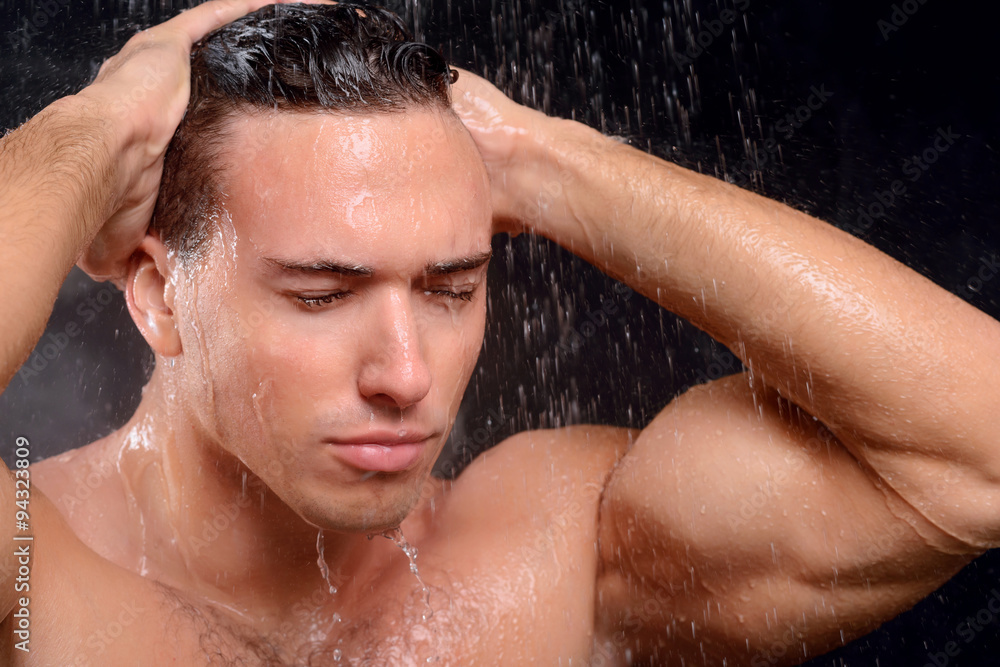 Handsome guy taking shower Handsome guy taking shower