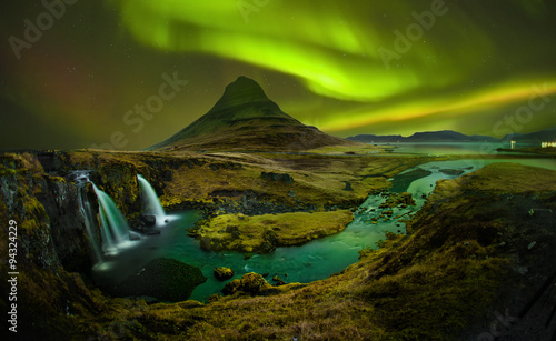 Aurora at Kirkjufell and Waterfall Kirkjufellsfoss, Landmark of
