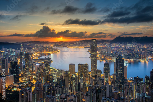 Hong Kong skyline at night and day