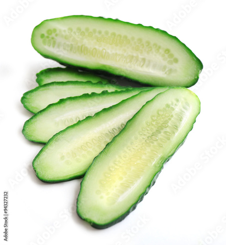 Sliced cucumbers isolated on white