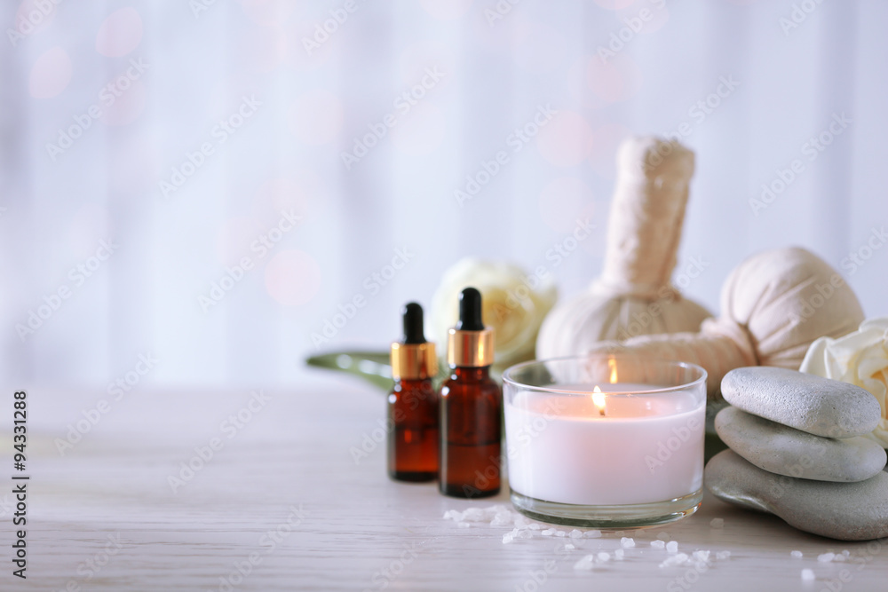 Beautiful composition of spa treatment on wooden table Beautiful composition of spa treatment on wooden table