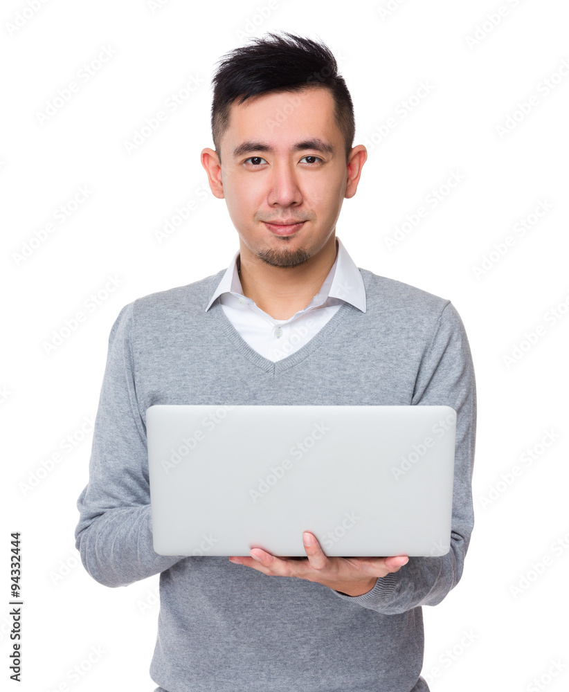 Asian Young Businessman use of the notebook computer Asian Young Businessman use of the notebook computer