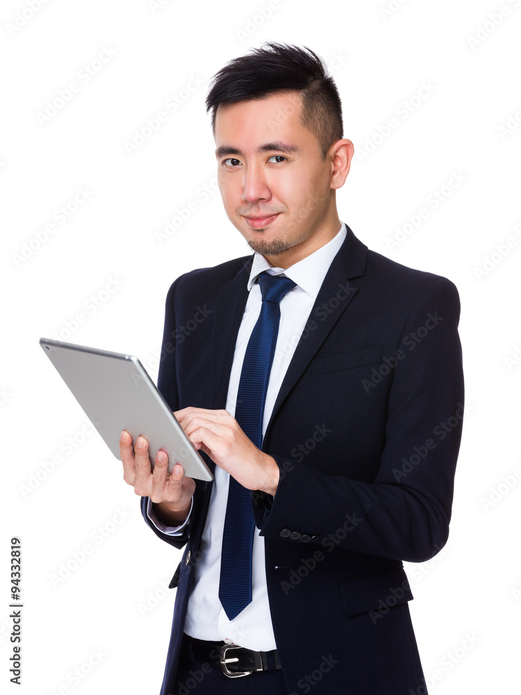 Young Businessman use of the tablet pc Young Businessman use of the tablet pc