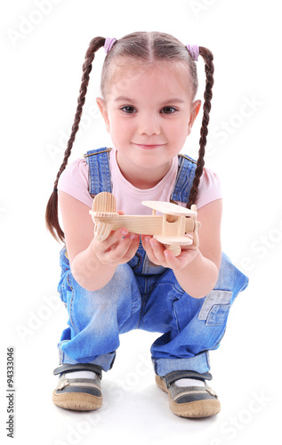 Beautiful little girl plays...