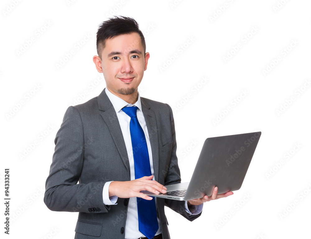 Businessman use of the notebook computer Businessman use of the notebook computer