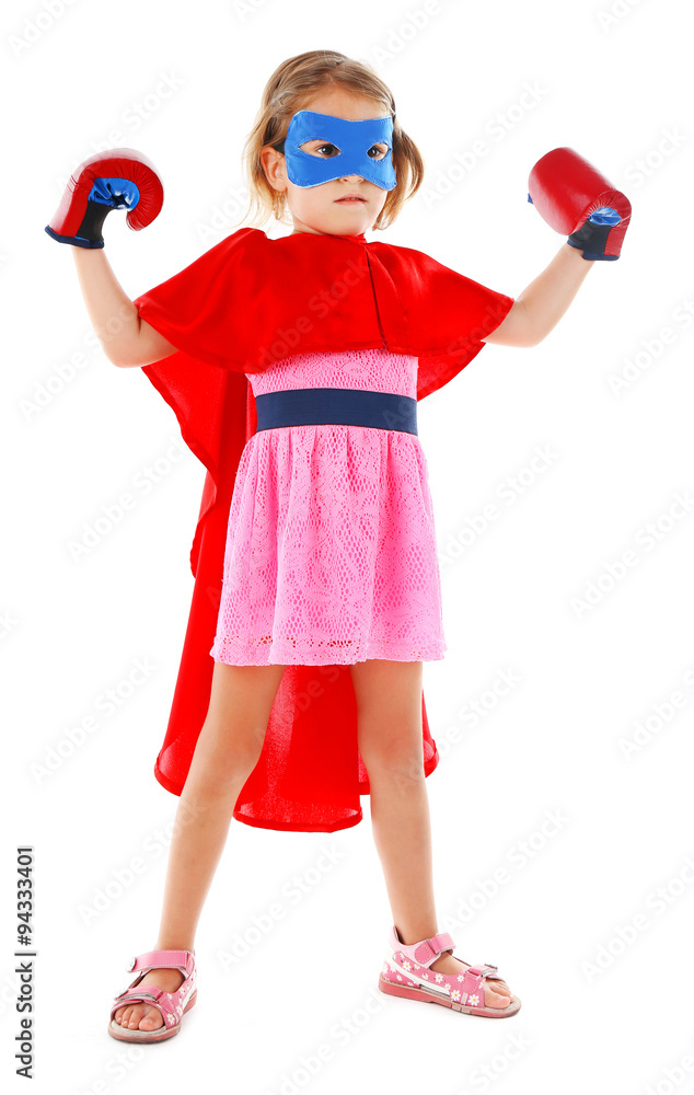Superhero little girl poses in boxing gloves isolated on white background Superhero little girl poses in boxing gloves isolated on white background