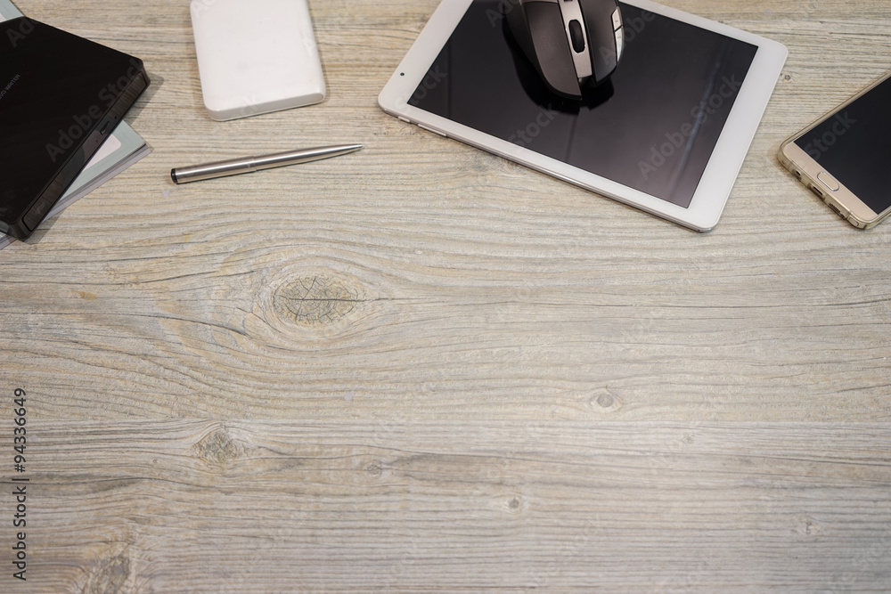 IT device with wooden background space IT device with wooden background space