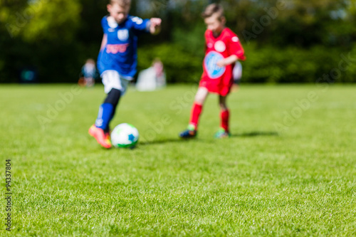 Boys soccer match blur