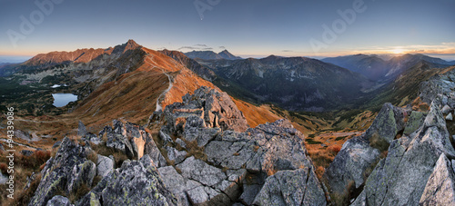 Mountain sunset panorama from peak - Poland Tatras