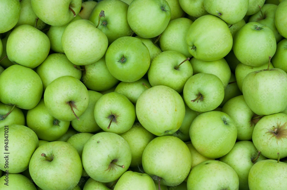 Heap of fresh green Granny Smith apples. Background image Heap of fresh green Granny Smith apples. Background image