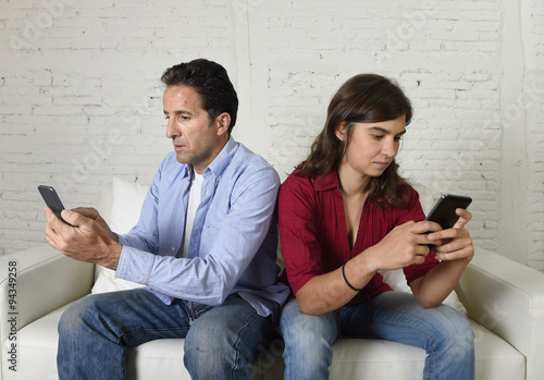 Bild auf Leinwand young antisocial mobie phonel addict couple ignoring each other using internet c