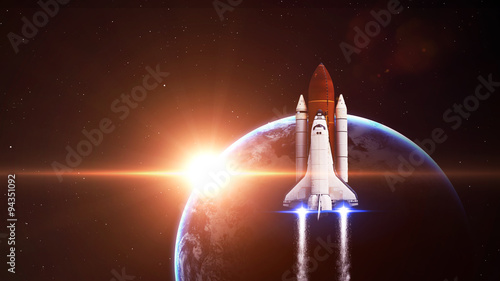 Fototapeta Naklejka Na Ścianę i Meble -  Space shuttle Leaving Earth - Elements of this Image Furnished By NASA