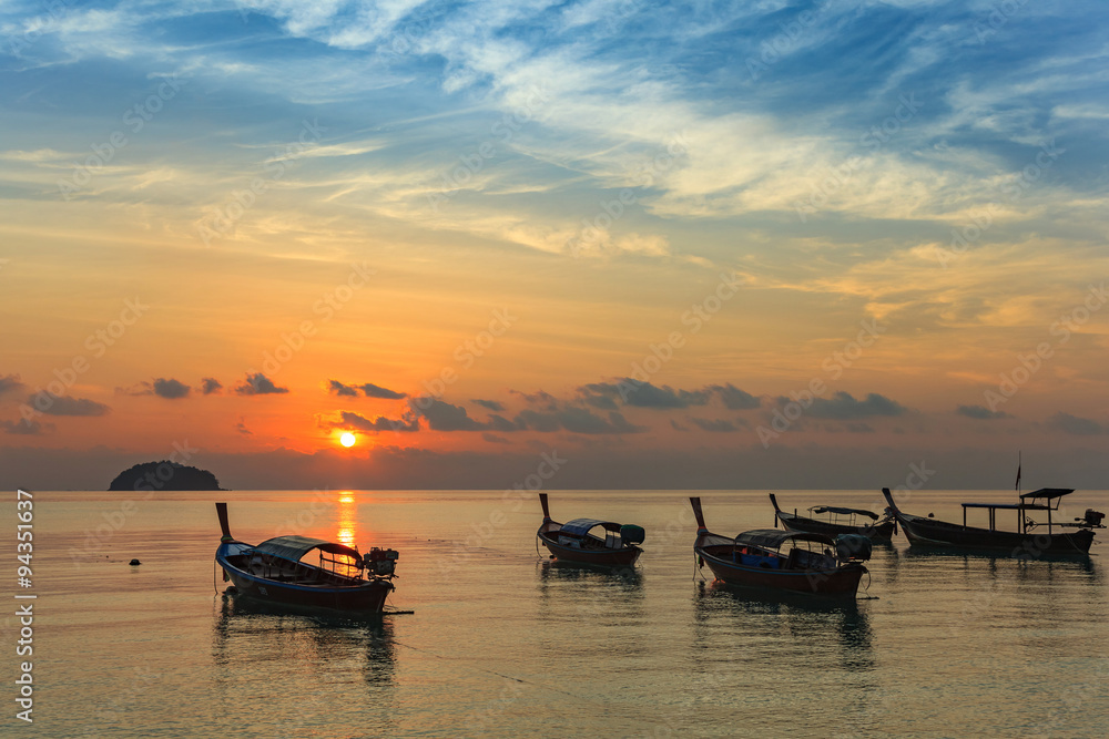 sunrise at Koh Lipe island and Longtail boat - Thailand