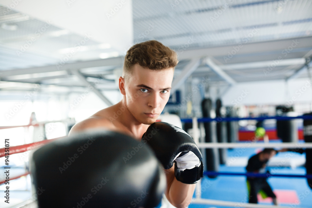 Action boxer gloves in training attitude Action boxer gloves in training attitude