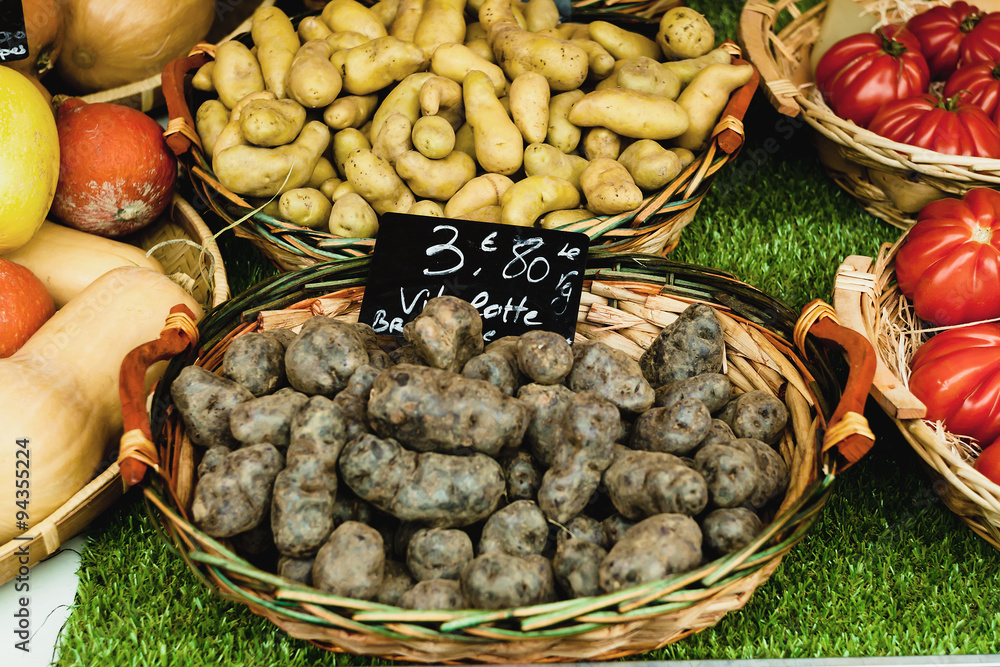 Street vegetable market in Nice, France. Purple potato.