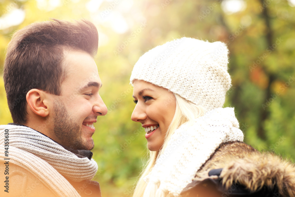 Young romantic couple in the park in autumn Young romantic couple in the park in autumn