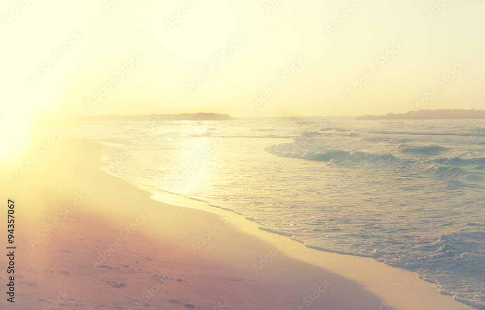 background of blurred beach and sea waves, vintage filter.
