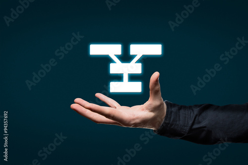businessman holds a virtual pictogram