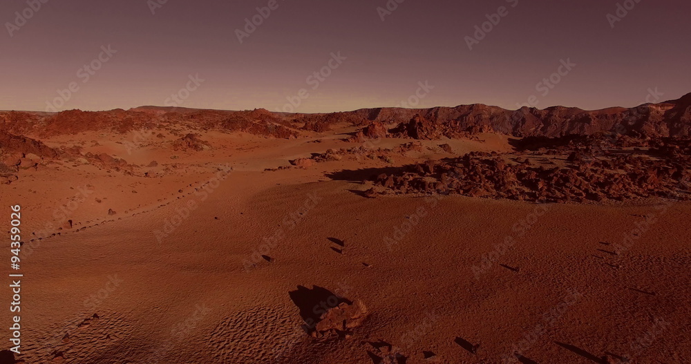 AERIAL flying forward above dramatic surface of planet Mars (artistic rendering)