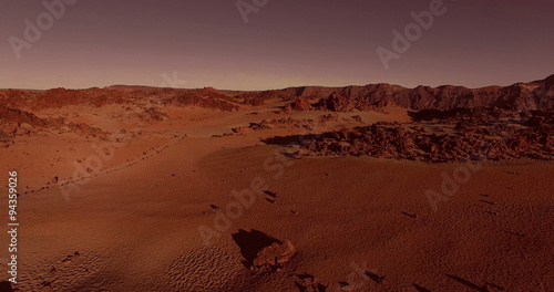 AERIAL flying forward above dramatic surface of planet Mars (artistic rendering)