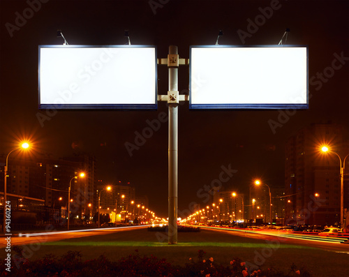 Double big white bill-board on lighting night street