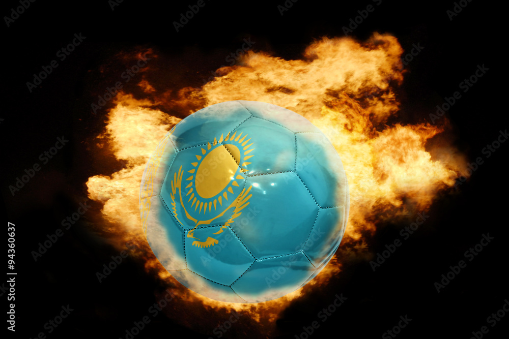 Fototapeta premium football ball with the flag of kazakhstan on fire