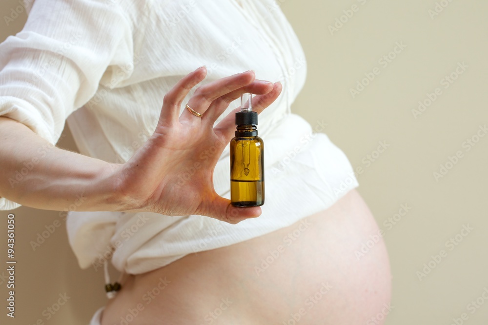 Fototapeta premium Essential oil for pregnant woman