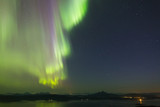 hanging colorful  aurora over fjord in norway