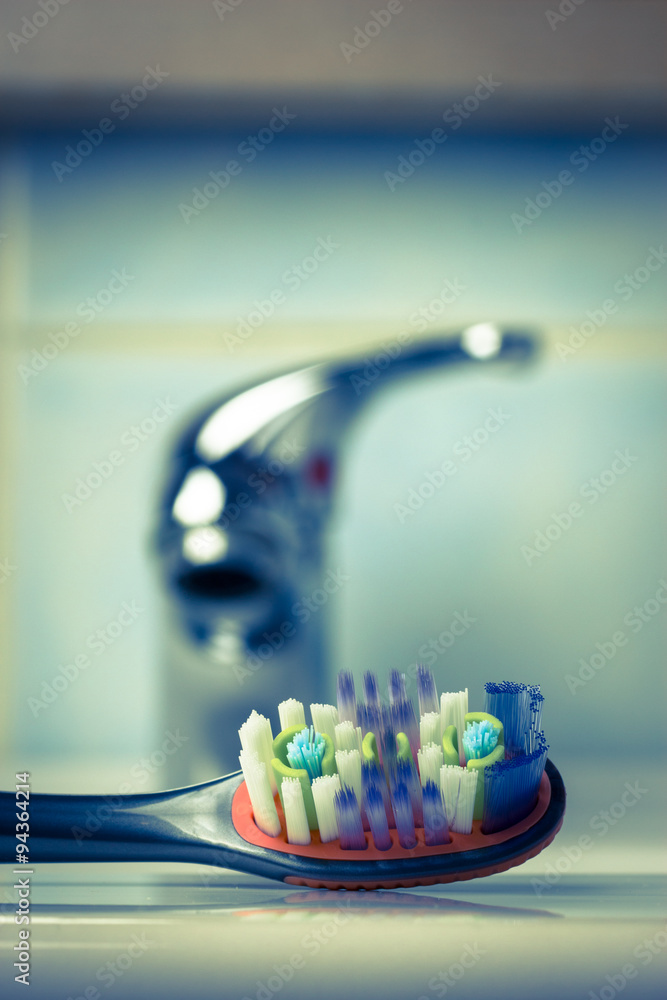 toothbrush in bathroom on sink toothbrush in bathroom on sink