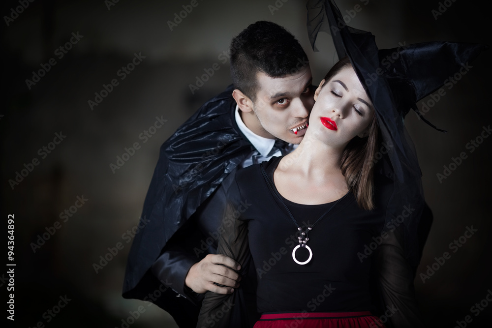Male Vampire Kissing Witch in the Neck Stock Photo Adobe Stock
