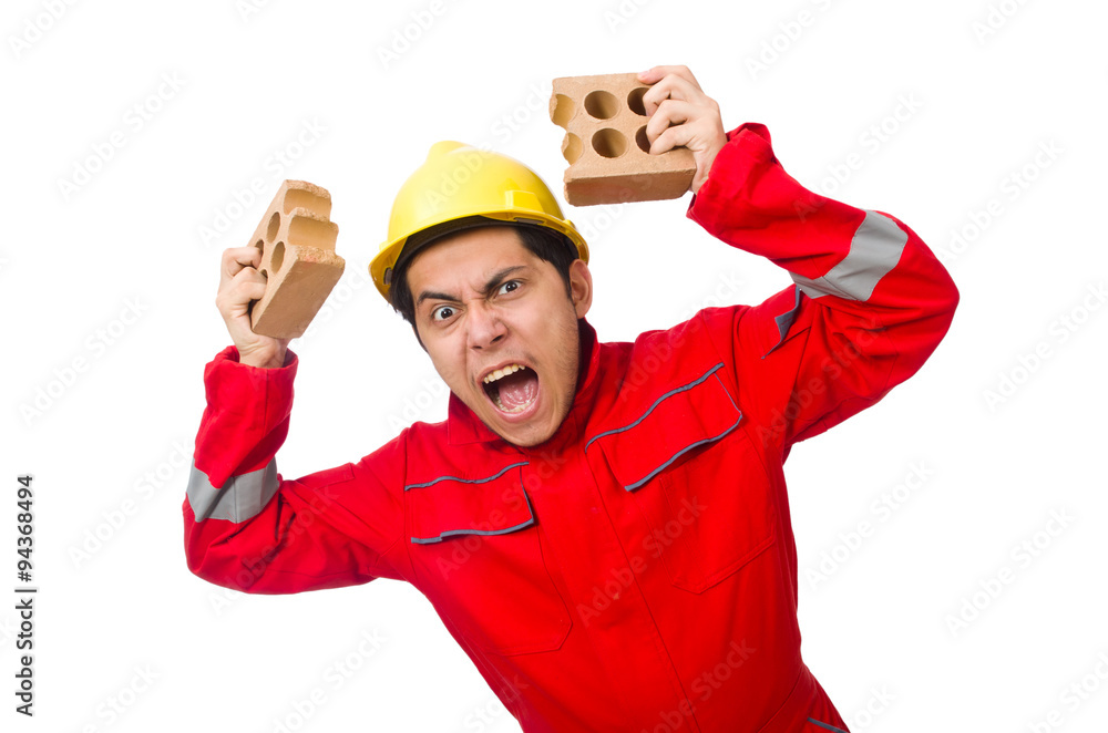 Construction worker with clay bricks on white Construction worker with clay bricks on white