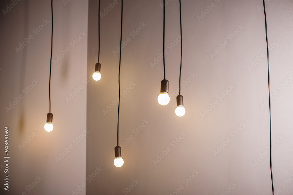 many lamps on a long cord and hanging light in the room many lamps on a long cord and hanging light in the room