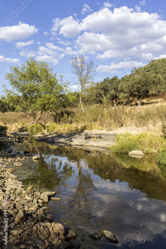 Countryside landscape scenic view of a fresh water stream in Alentejo region.