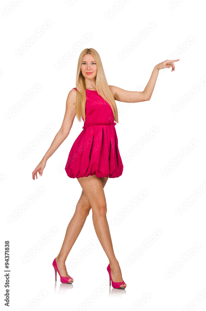 Young woman in pink dress isolated on white