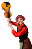 Funny woman in scottish clothing with violin