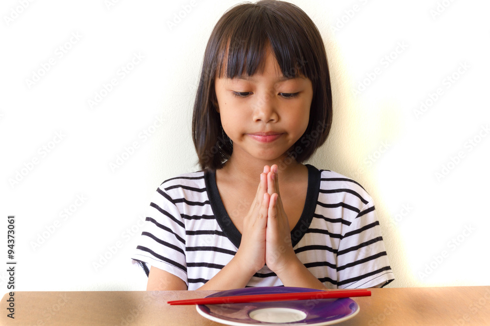 Thankful. Children girl fold her hands to Thank you God for my supper today Thankful. Children girl fold her hands to Thank you God for my supper today