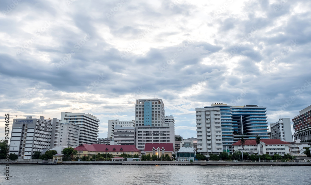 Siriraj hospital in night light and cloudy view Siriraj hospital in night light and cloudy view