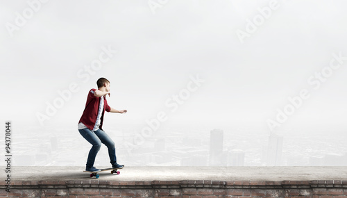 Guy on skateboard © Sergey Nivens