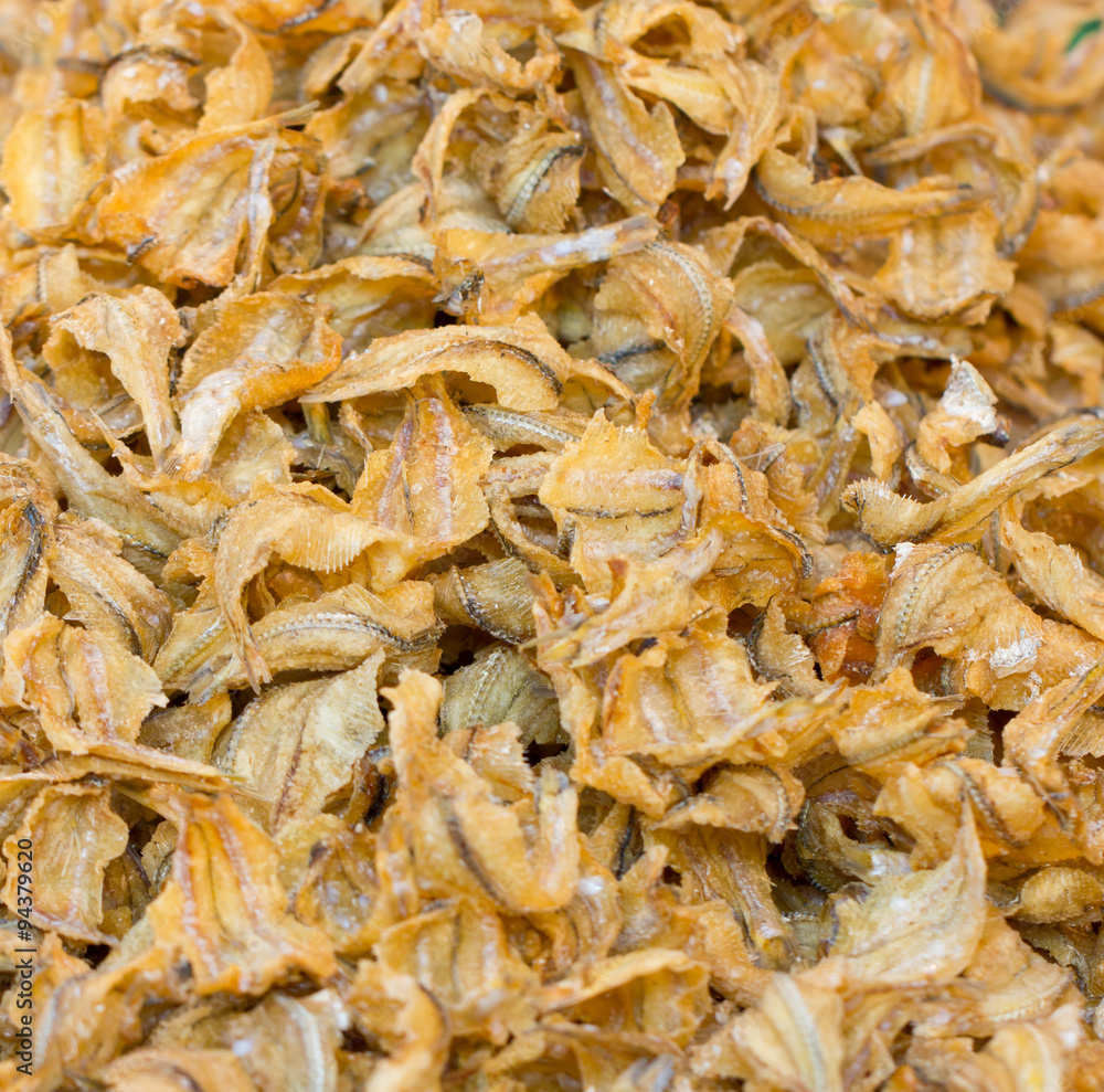 Heap of crispy fried fish in the market. Heap of crispy fried fish in the market.