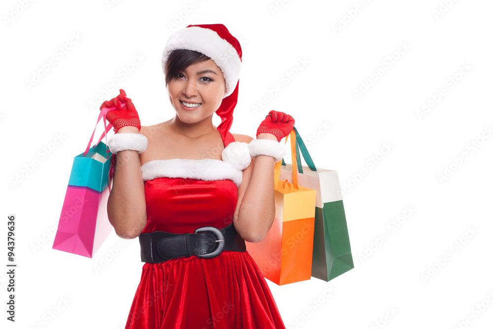 happy shopping young woman raise arms with bags - isolated on wh happy shopping young woman raise arms with bags - isolated on wh