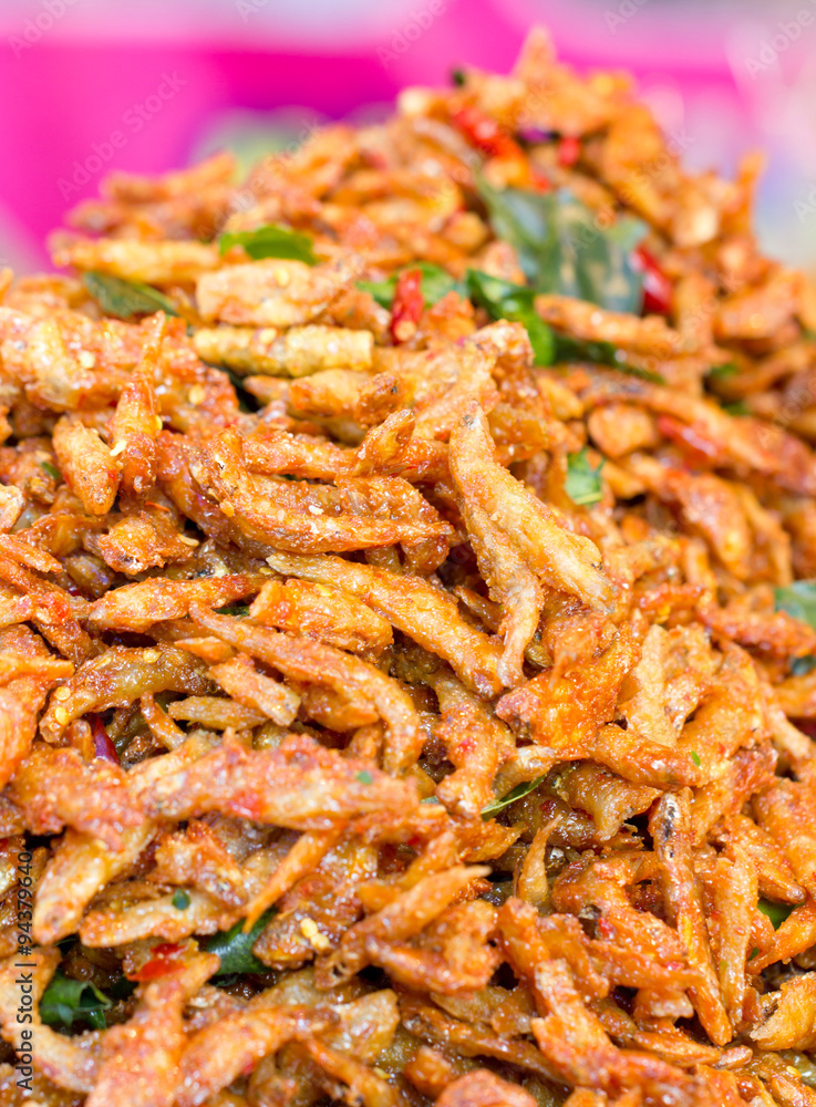 Heap of crispy fried fish in the market. Heap of crispy fried fish in the market.