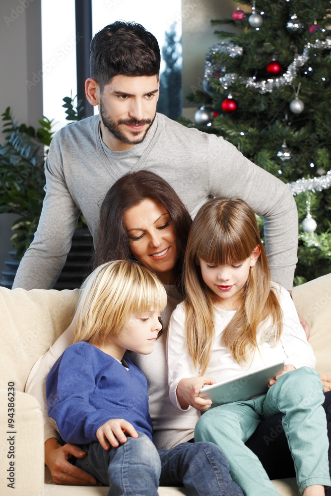 Happy family at christmas tree Happy family at christmas tree
