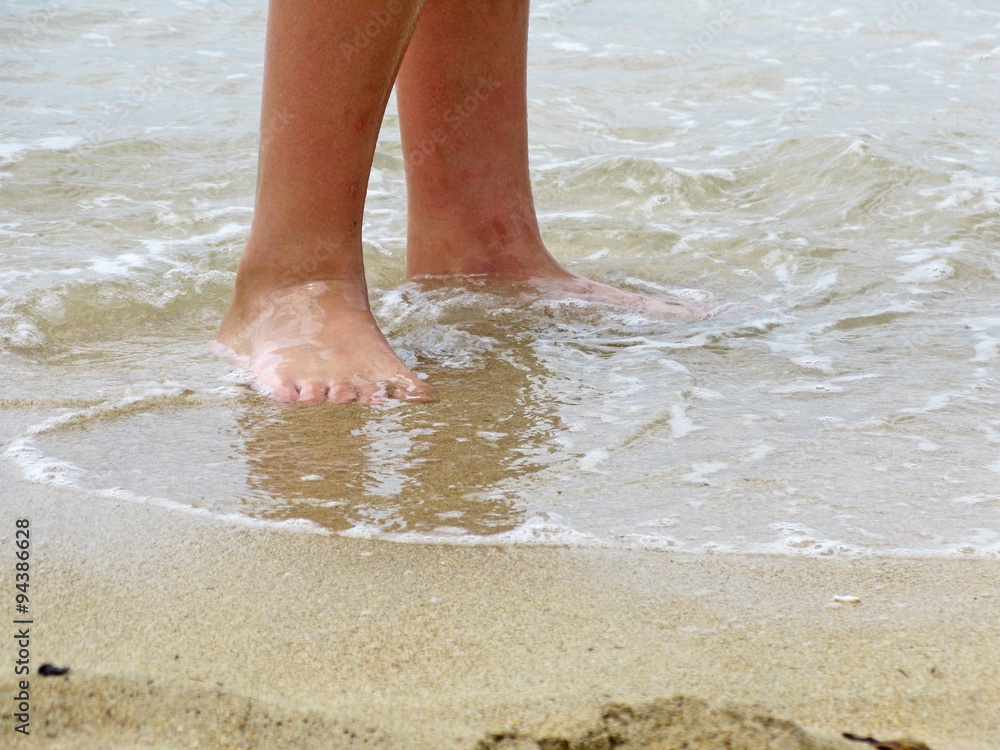 Sandy beach closeup with wave in Mallorca, Balearic islands, Spain. Sandy beach closeup with wave in Mallorca, Balearic islands, Spain.
