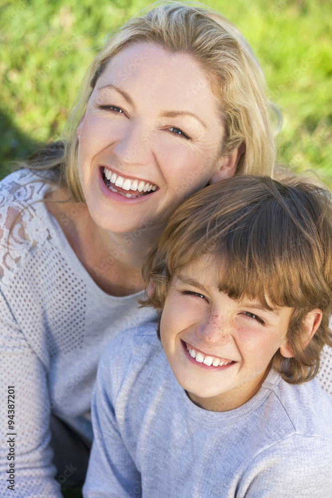Mother Son Woman Boy Child Sitting Outside in Sunshine Mother Son Woman Boy Child Sitting Outside in Sunshine
