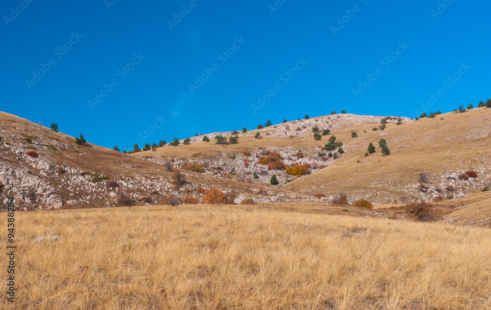 Autumnal landscape with Babuhan Yaila natural reserve in Crimean peninsula Autumnal landscape with Babuhan Yaila natural reserve in Crimean peninsula